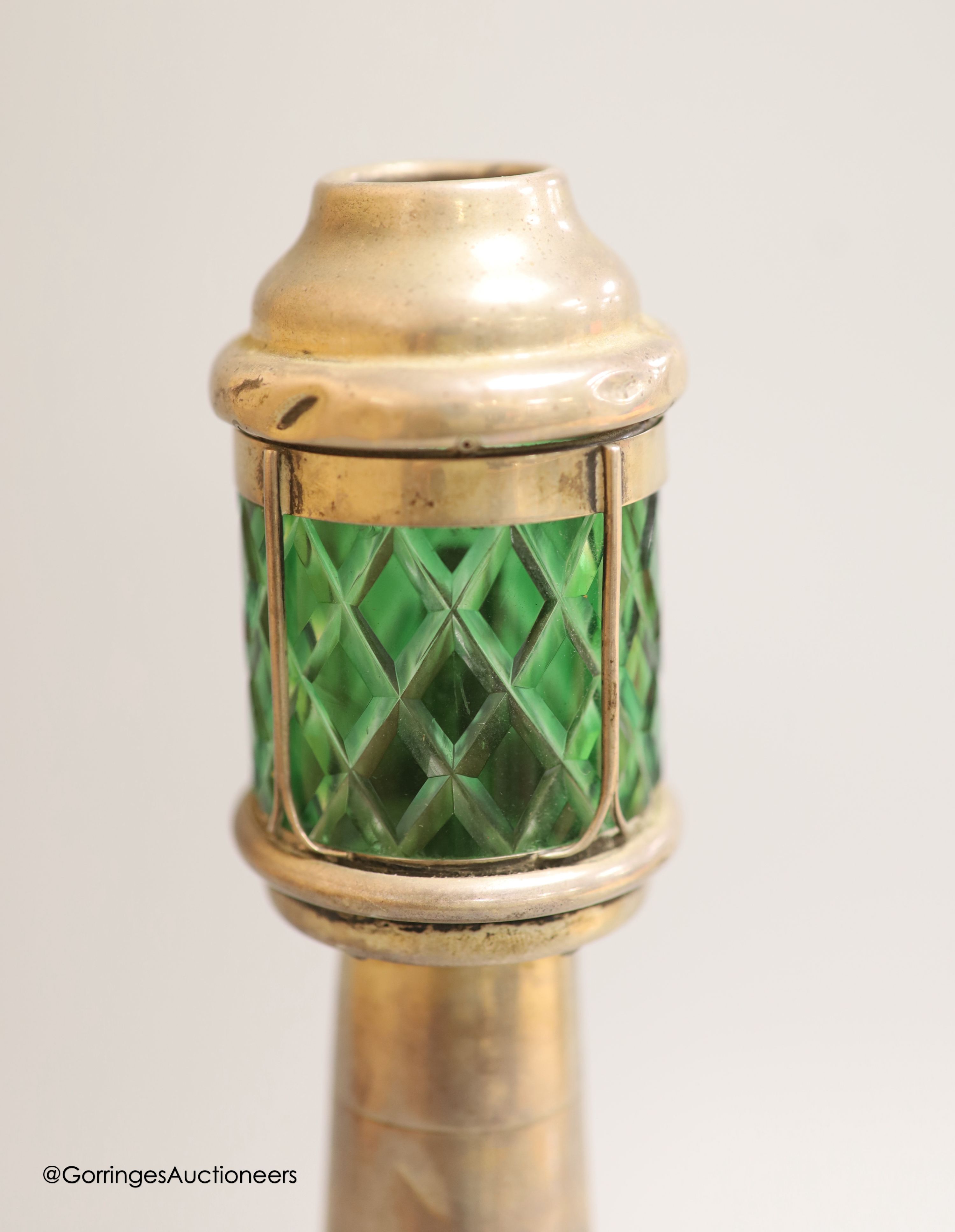 An Edwardian silver and green glass mounted novelty table lighter, modelled as a lighthouse, by Grey &Co, London, 1907/8, 25.4cm, (a.f.)